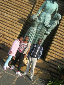 Nieces and Nephew  infront of the Statue of a Voortrekker Woman